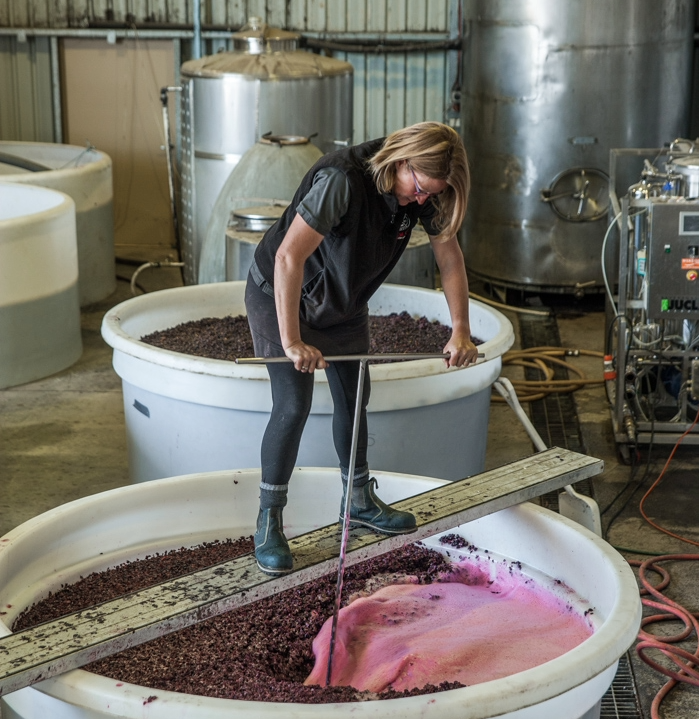 Bec Duffy hand punching red wine